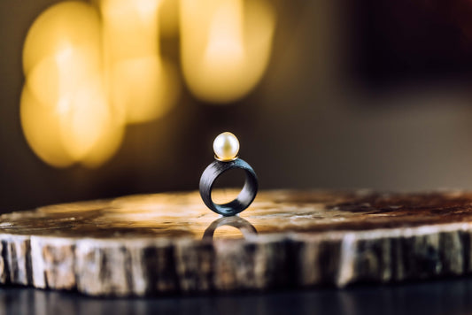 carbon, yellow gold, saltwater pearl