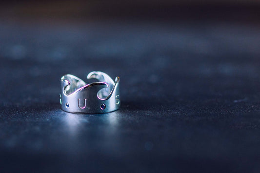 silver, blue sapphire, engraving TRUST