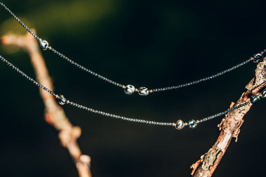 necklace, keshi tahitian pearls, hematite, yellow gold