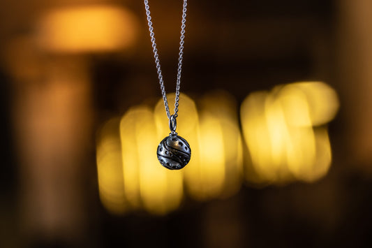 pendant, carved Tahitian pearl, white gold